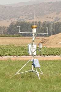 Weather stations that measure evapotranspiration can be used to estimate the water needs of vegetable crops.  Photo credit: Michael Cahn