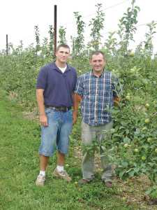 Dan Boyer’s sons Mark, 19 (left), and Seth, 26 (right), play an active role in the business. Mark and Seth are also members of the Mid-Atlantic Young Grower Alliance. (Photo credit: Brian Sparks)
