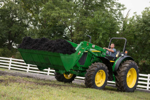 The 5115M Tractor makes an ideal loader tractor for many chores around the farm and homestead.