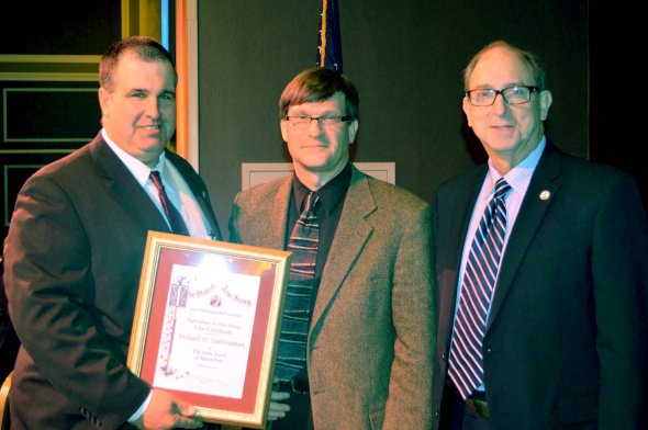 American Vegetable Grower Columnist And Rutgers Extension Agent Receives Distinguished Service Award at the New Jersey (NJ) State Agricultural Convention.  Pictured from left: NJ State Board of Agriculture President Richard Norz, Richard VanVranken and NJ Secretary of Agriculture Douglas Fisher