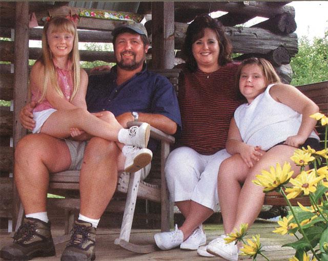 Greg Nix takes a moment to relax with his wife Lisa, daughters, Bryson and Christen.