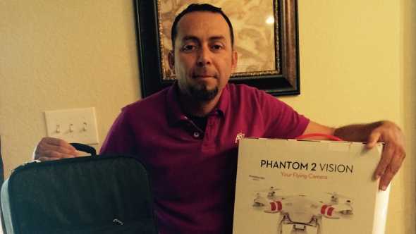 Jesus Luna, Meister Media Worldwide Phantom 2 Quadcopter giveaway winner, posing with his new prize