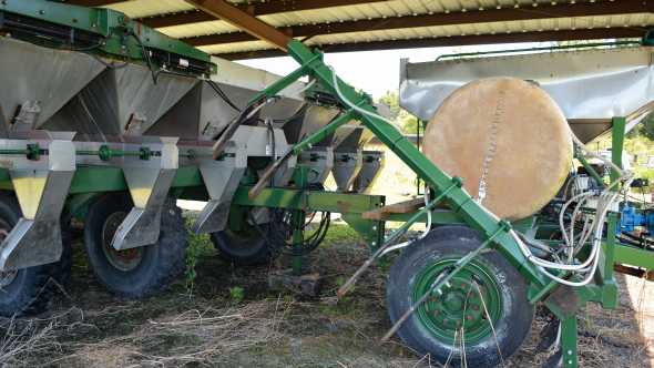 Fertilizer bander in a Florida potato field