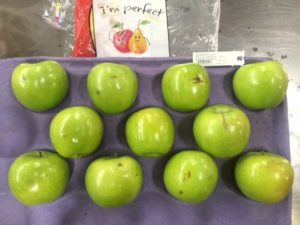 These slightly blemished apples, so-called "ugly fruit," will be sold in Walmart stores as "I'm perfect." (Photo credit: Walmart)