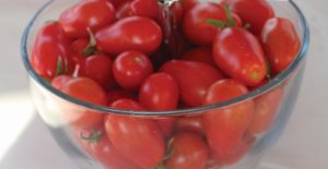 A determinate grape tomato, ‘Carmesin’ comes with a strong disease-resistance package.