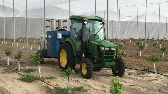 Smaller John Deere tractor for use in citrus screenhouse
