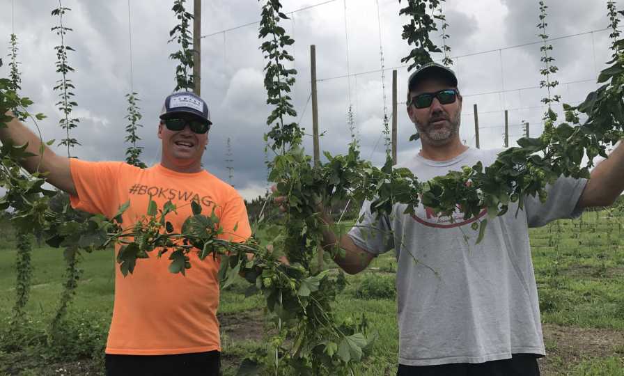 The crew from Caloosa Hop Co. showing off fruits of their labor