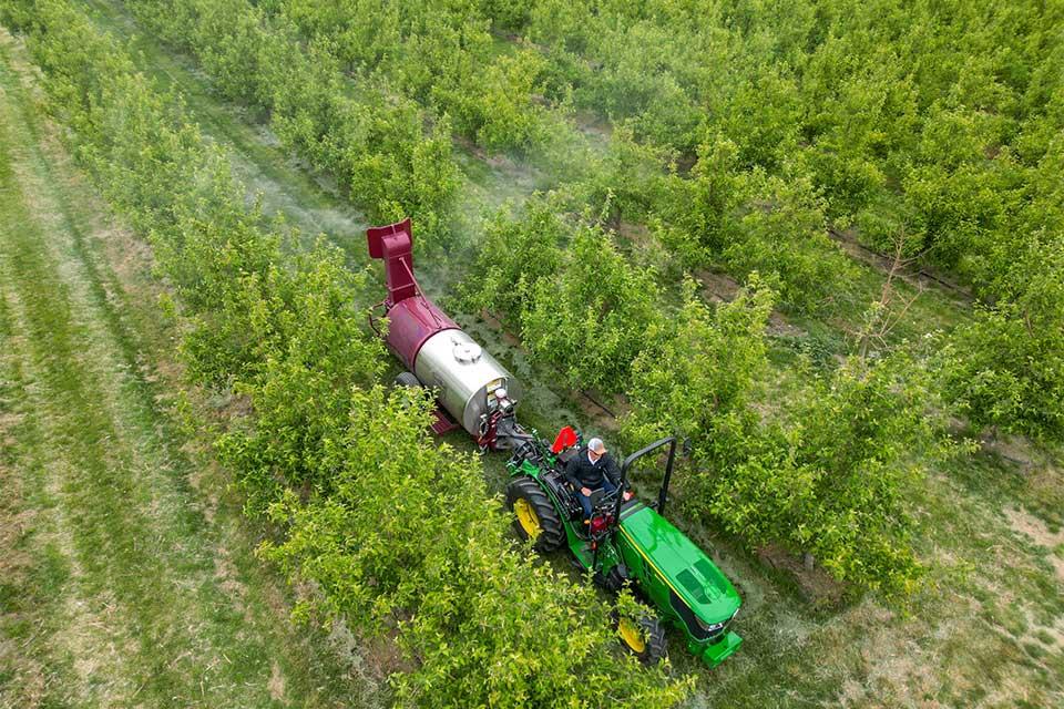 SmartApply LectroBlast sprayer in the orchard